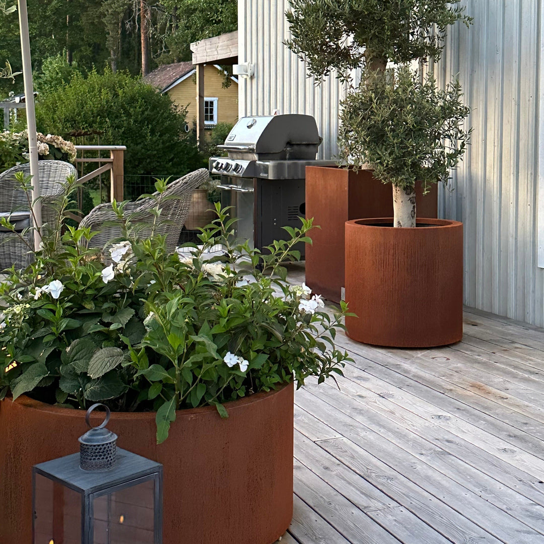 Runde plantekasser med buet kant